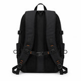 Black waterproof school backpack — back view with padded adjustable shoulder straps