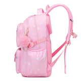 Girls school backpack side view — side pocket and pom-pom charm with pearl chain