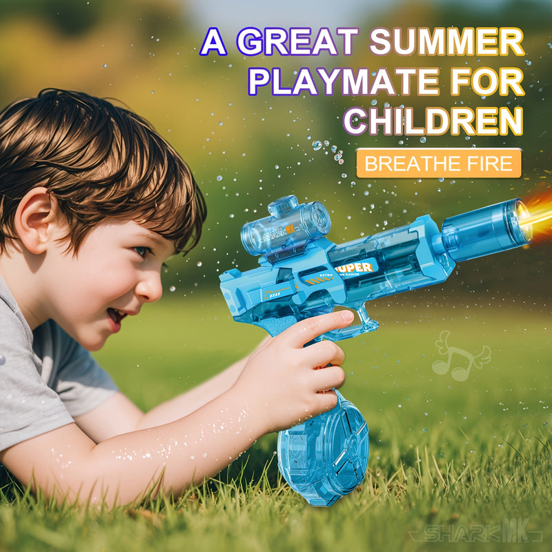Child playing with a blue toy gun labeled 'Breathe Fire' in a grassy outdoor setting.