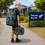 Kids football school backpack and lunch bag set NZ, boy carrying green soccer print backpack and insulated lunch box on the way to school
