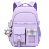 Purple kids school backpack with plaid front pockets, side mesh pockets, and a grey bunny plush charm